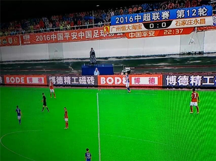 黄瓜视频黄色网站精工磁砖在恒大赛场广告.jpg
